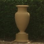 Large terracotta urn in garden