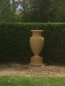 Large terracotta urn in garden